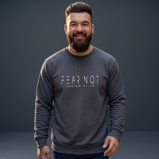 A smiling man wearing a Crown N Thread charcoal grey crewneck sweatshirt with Fear Not Isaiah 41:10 embroidery.