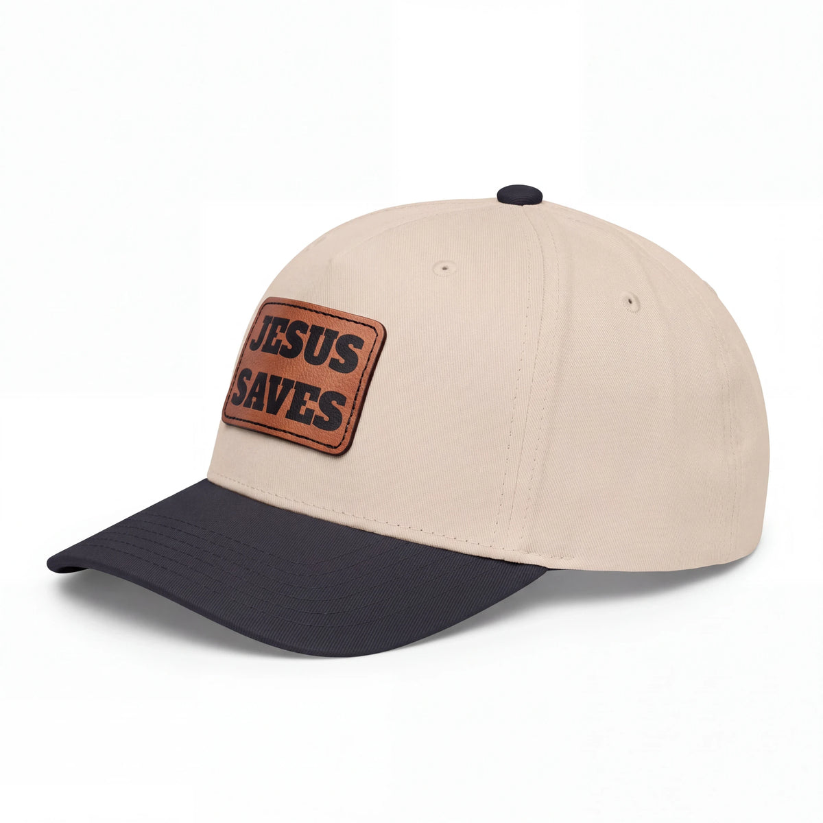 Crown N Thread baseball cap with a beige crown, dark brim, and a light brown vegan leather Jesus Saves patch.