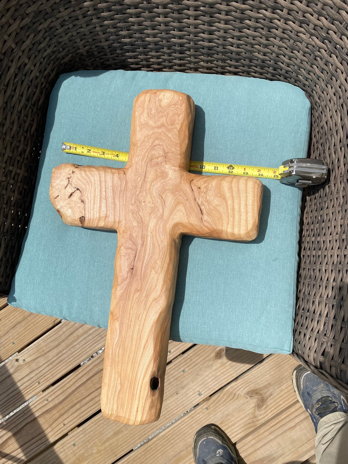 Crown N Thread large handcrafted wooden cross with a natural distressed grain finish measured with a tape measure.