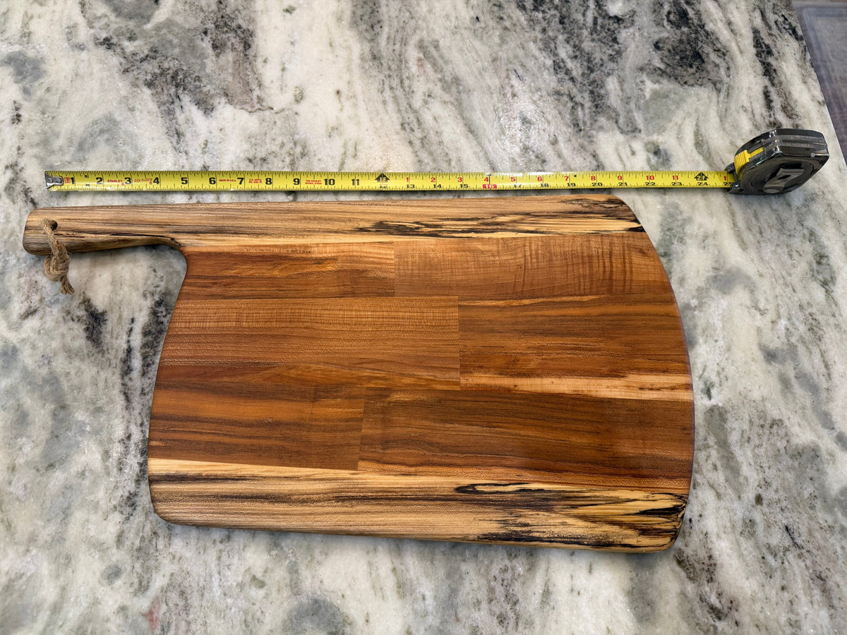 Crown N Thread handmade oiled wood charcuterie board with a natural grain finish and a rustic jute handle
