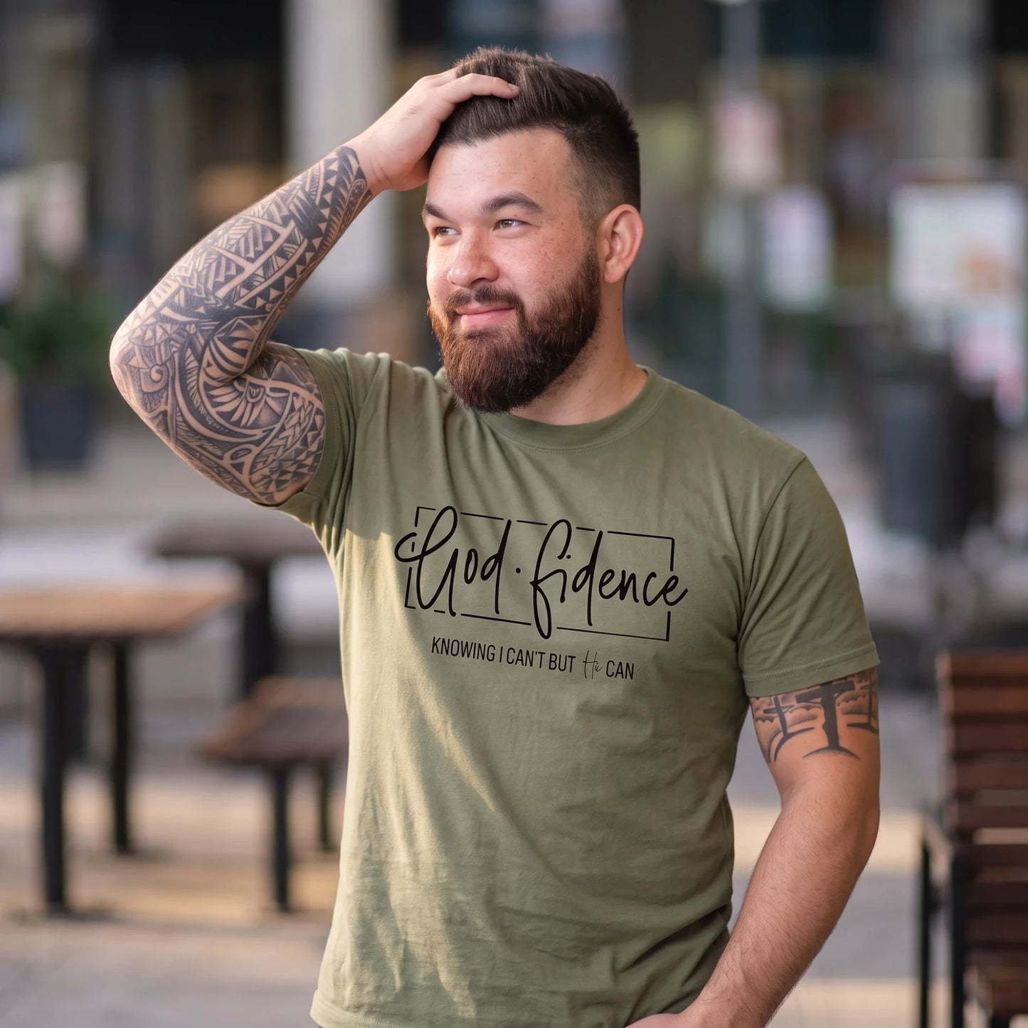 Bearded man wearing a Crown N Thread olive green crew-neck cotton t-shirt with GodFidence inspirational script text.