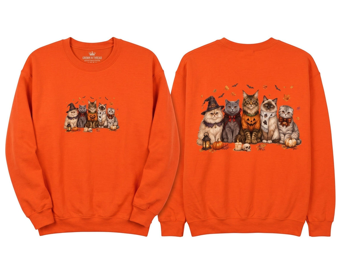Crown N Thread orange crewneck sweatshirt featuring a cute embroidered scene of five cats with pumpkins and leaves.